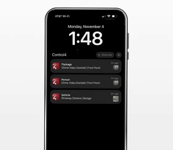 Smartphone showing real-time security alerts.
