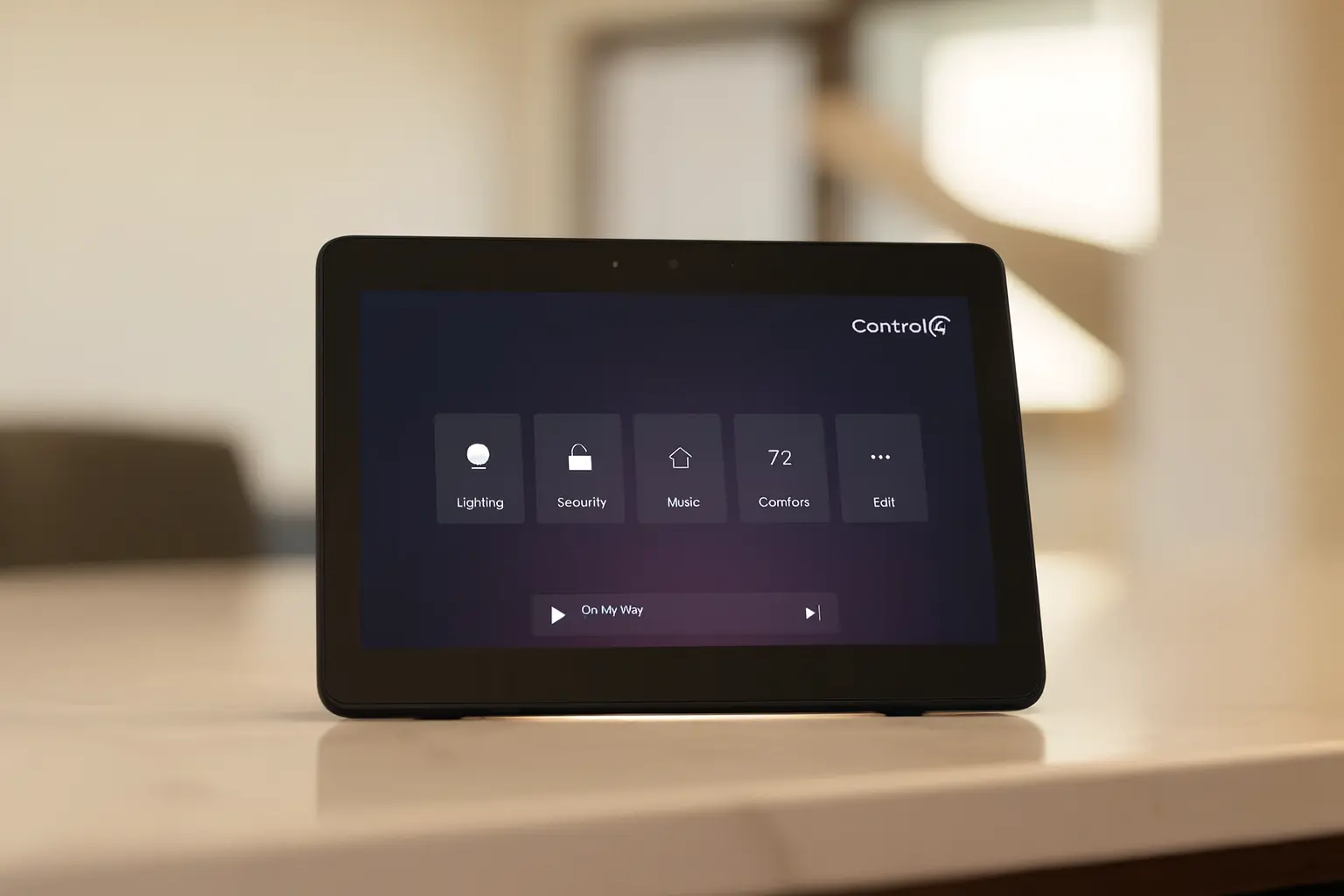 Control4 T4 touchscreen on a table.