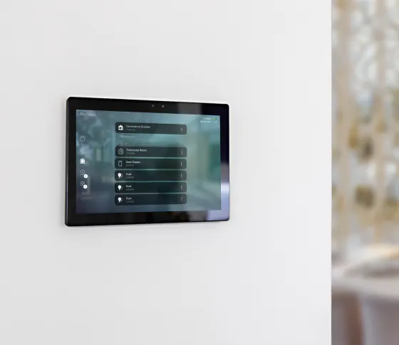 Tabletop Control4 touchscreen on a counter.