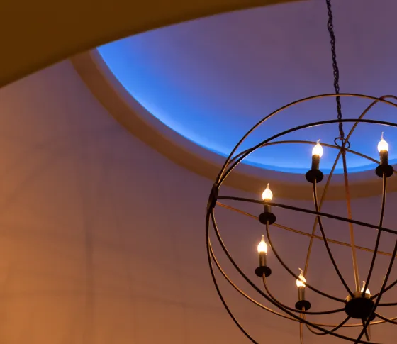 Room with colorful accent lighting and tunable white ambient light.