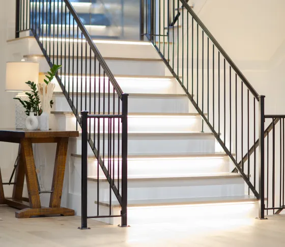 LED profiles installed in cabinetry and stair details.