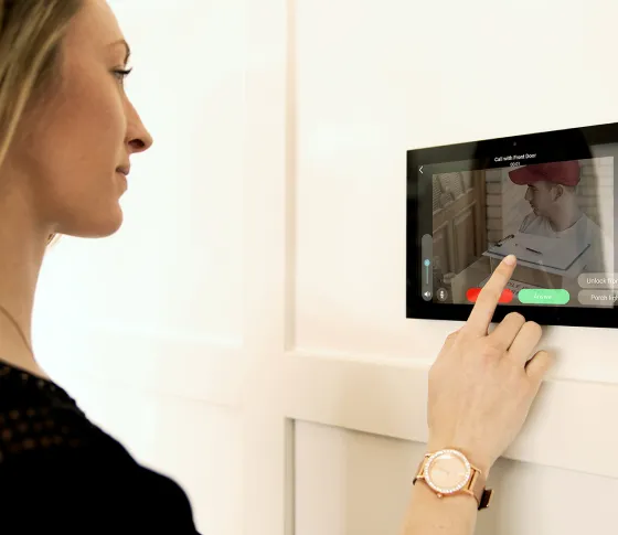 AI surveillance interface highlighting people, vehicles and packages.